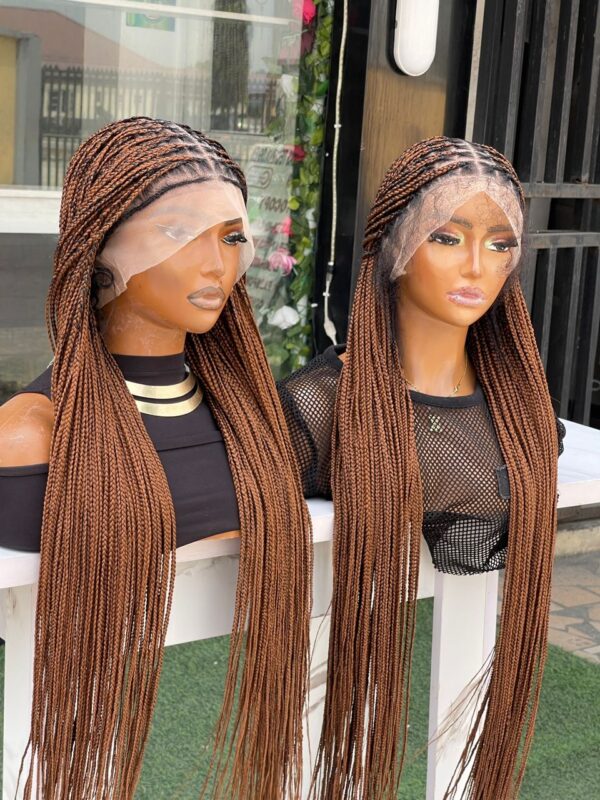 Human hair blend full knotless braid wig.